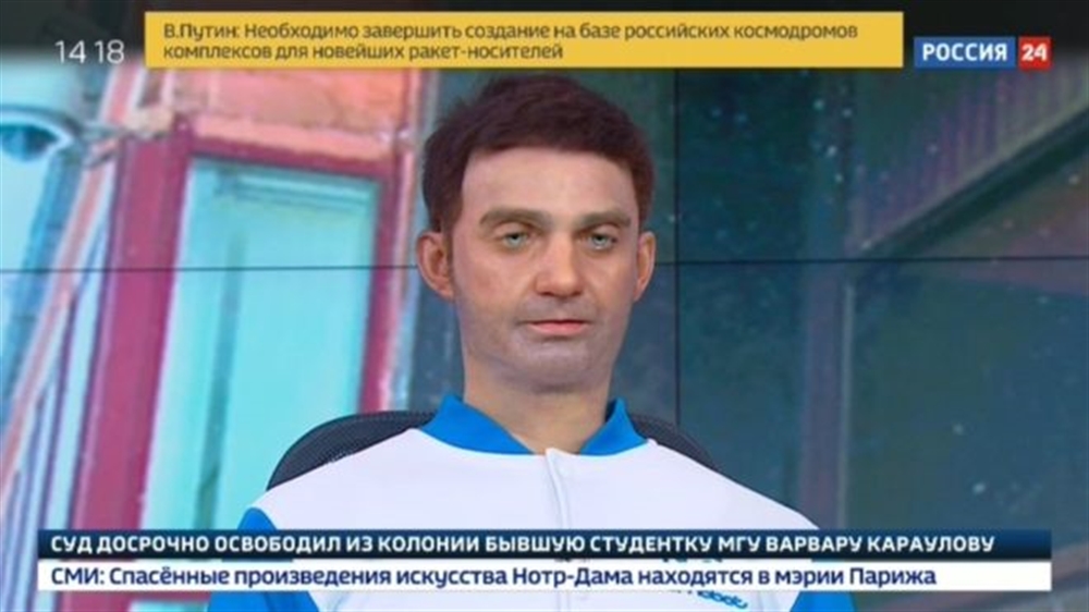 شاهد.. روبوت يحتل مقعد المذيع في قناة إخبارية روسية
