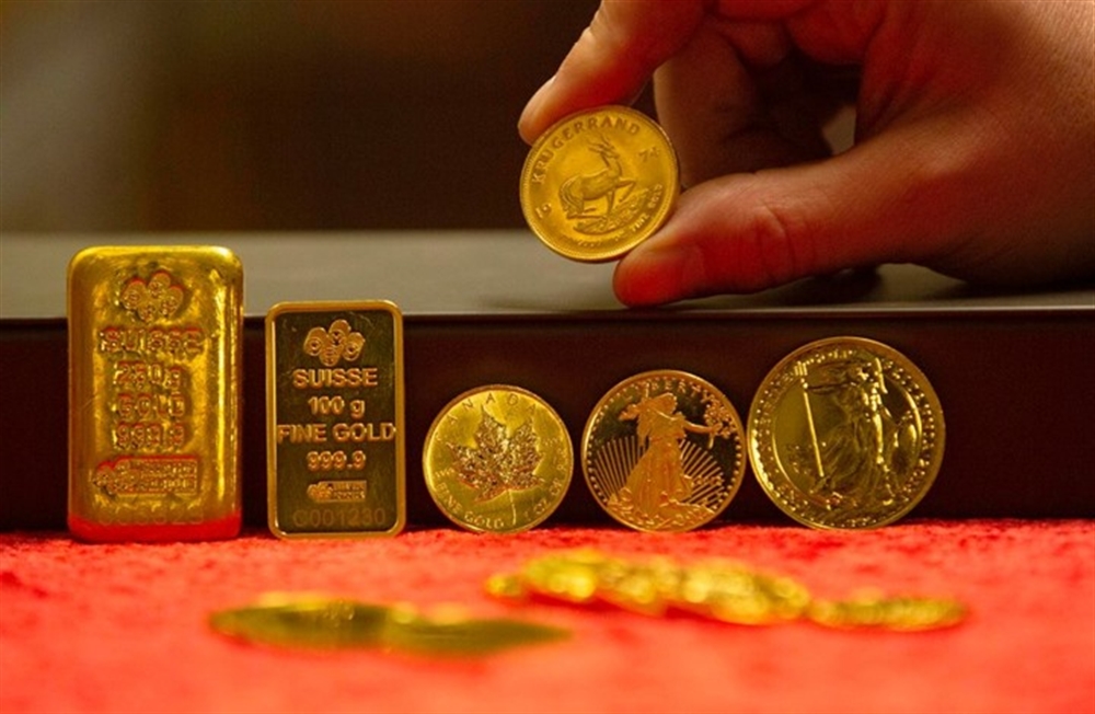 هبوط الذهب وارتفاع الدولار بعد بيانات أمريكية إيجابية